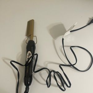 Electric pressing comb